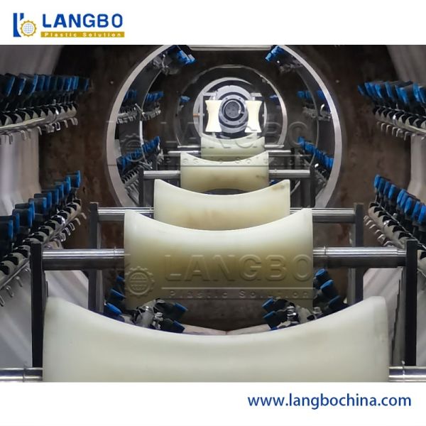 Close-up view of HDPE pipe extrusion process
