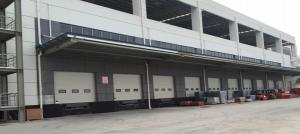 Wholesale Automatic Steel Industrial Sectional Doors 24dB Sound Insulation 450N/M2 Wind Load from china suppliers