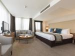 Pahang guestroom hotel furniture factory for fabric padded bed and tall TV