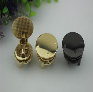 Wholesale Most popular novelty design round shape light gold bag hardware twist turn locks for leather from china suppliers