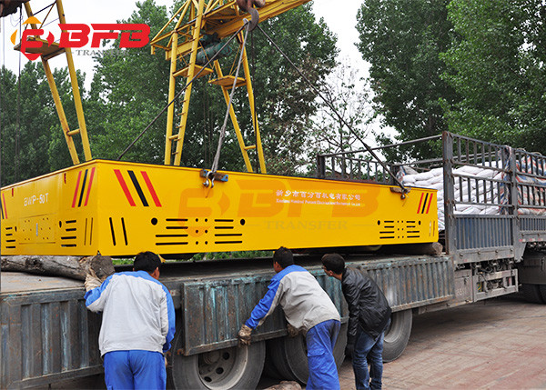 Electric Battery Operated Trackless Trolley Cart On Floor For Workshop Parts Handling