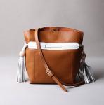 2016 summer new Korean fashion spell color tassel leather handbag drawstring