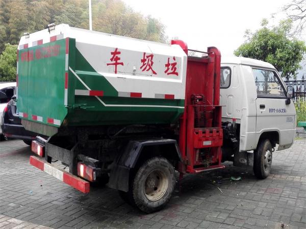 Quality Small Side Loading Barrel Lifting Waste Removal Trucks For Old Street Garbage Collection for sale