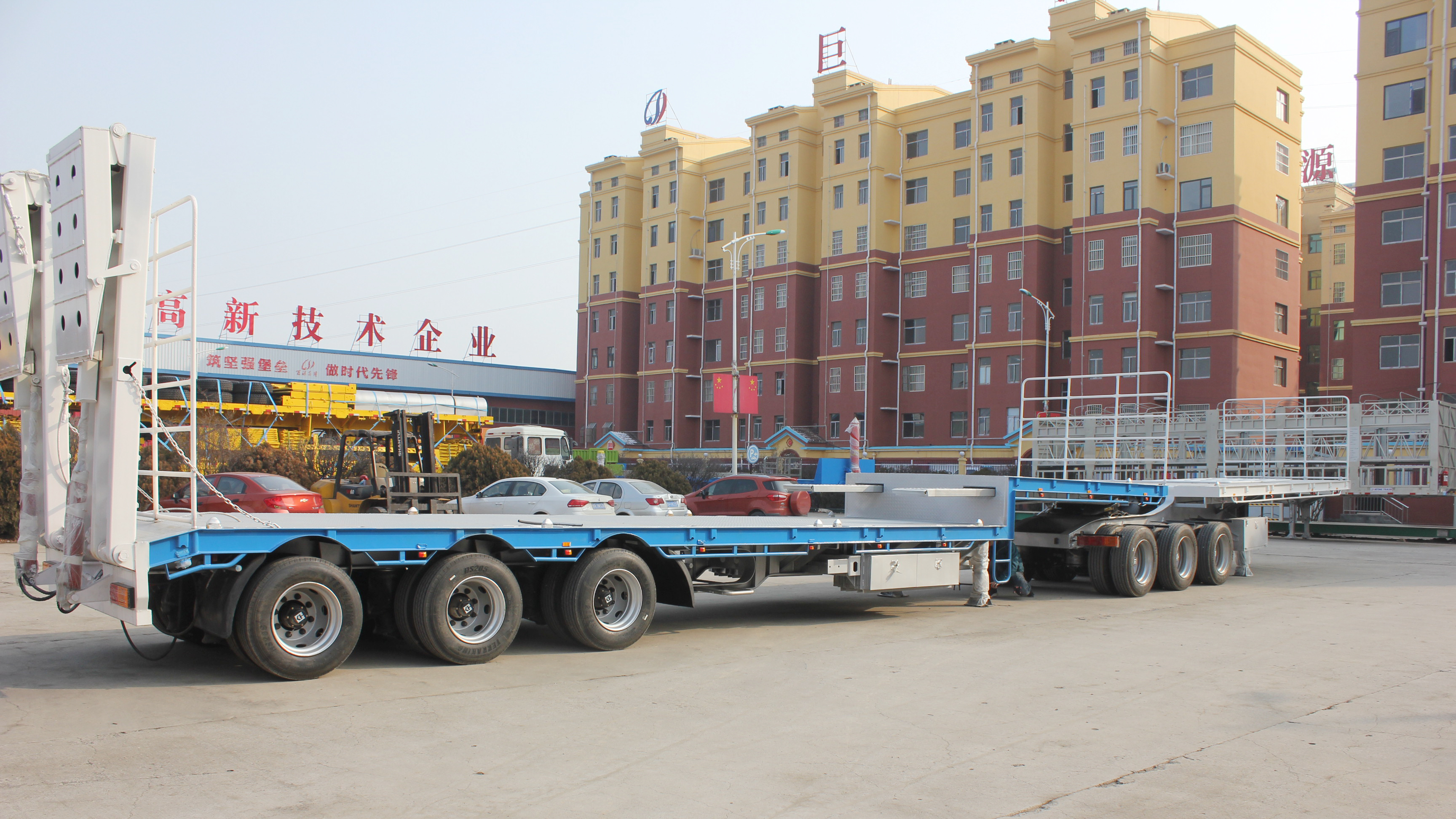 Standard 28T Landing Gear Inter Link Flatbed Semi Trailer with 80-120 Tons Rated Load