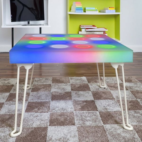 Interactive game mode with colorful LED lighting activated on table surface