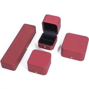 Wholesale Wind Red Sleek PU Leather Jewelry Storage Packaging Box with Gold Button Ornament from china suppliers
