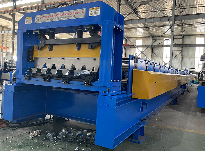 Metal decking machine