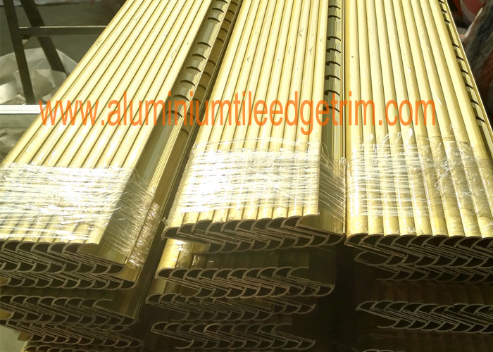 matt gold aluminium tile trim profile in shrink film