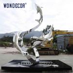 Large outdoor metal art abstract marine animal dolphin and ribbon stainless