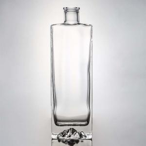 China Super Flint Glass Custom Mountain Base 750ml Whisky Rum Glass Liquor Bottle for Vodka Gin on sale