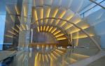 Stainless Steel Curved Glass Staircase Modern House Decoration With Wall Mounted