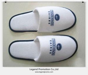 China Cheap disposable hotel slippers with Customized logo on sale