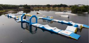 Wholesale OEM Inflatable Floating Water Park Obstacle Course Jumping Sport Game from china suppliers