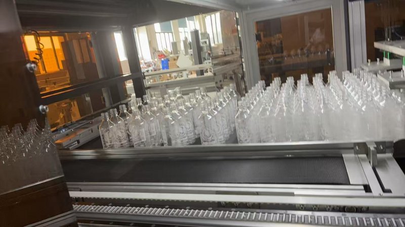 Vertical Mineral Water Bottle Packing Machine Automatic Cartoning Case Packer 1.5KW/H
