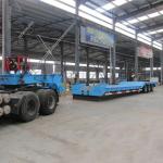 2180mm Tread Steel 2 Axles Lowbed Semi Trailer with Hydraulic Rear Ladder