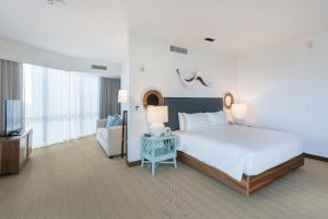 Wholesale Hua Hin Tourist Resort Hotel room furniture made wood structure with fabric bed and chaise lounge sofa TV stand from china suppliers