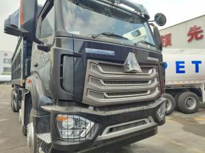 Wholesale HOWO NX 380HP RHD Black Tipper Dump Truck With Tarpaulin Flap from china suppliers