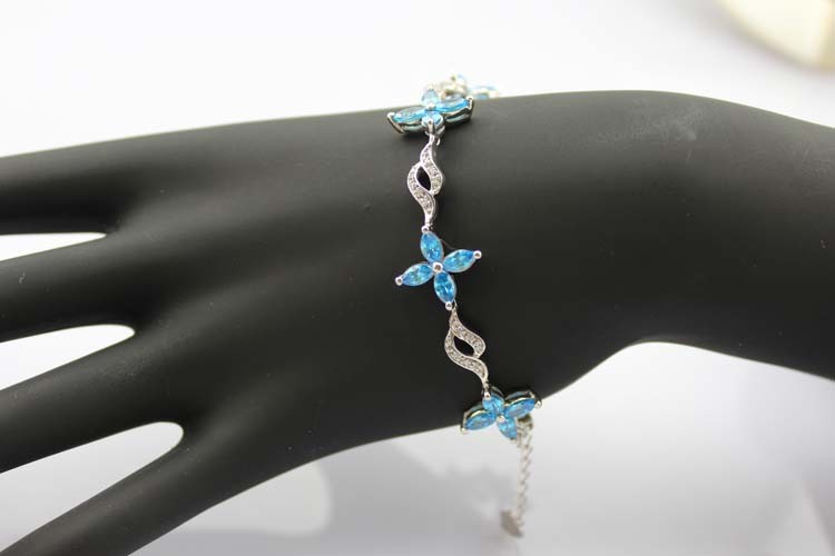 925 Silver Jewellery Quatrefoil Blue Topaz Cubic Zircon Tennis Bracelet (B04BLUE)