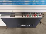 Sliding panel saw wood cutting machine