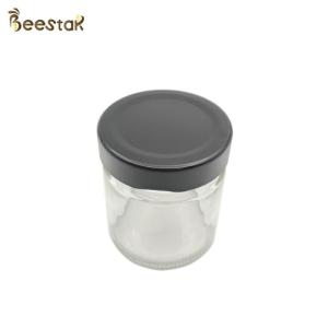 Wholesale 250ml Honey Jar And Spoon Glass Bottle For Honey Packaging from china suppliers