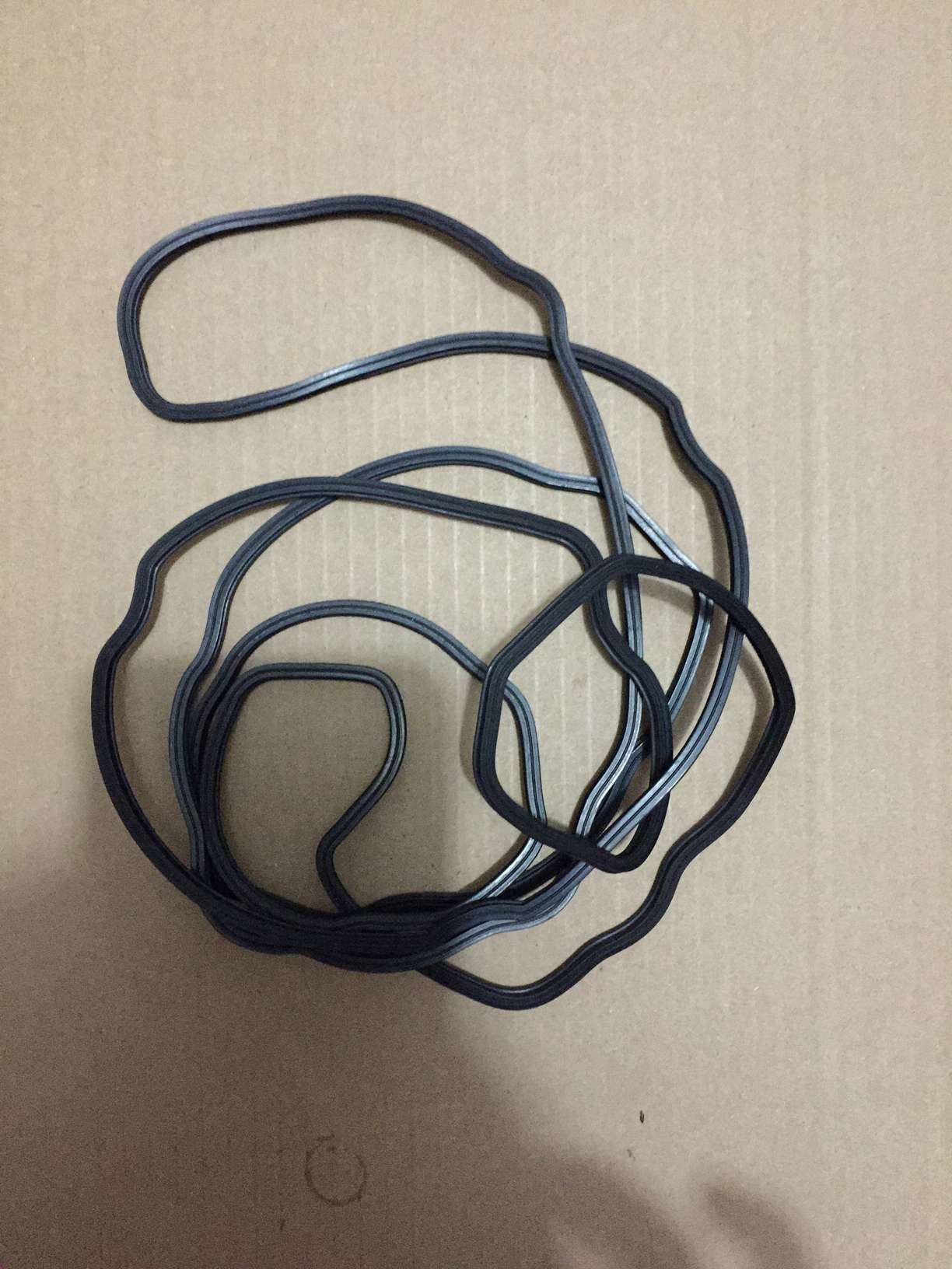 part No. :6745-11-7810 Gasket use for komatsu PC300-8 WA430-6 Rocker Arm Housing and Rocker Arm