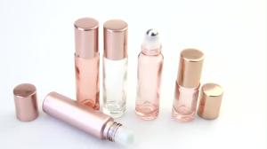 Wholesale 5ml 10ml Round Glass Essential Oil Bottle Pink Roller Roll With Aluminum Cap from china suppliers