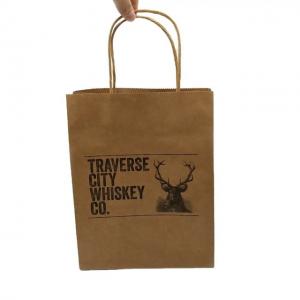 China Custom Brown Kraft Paper Shopping Bag Recyclable Paper Gift Bags With Handles on sale