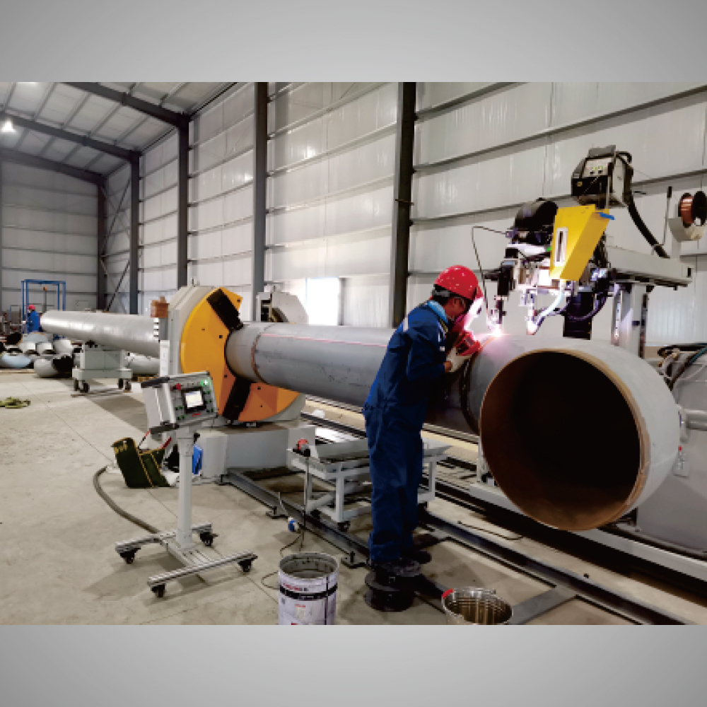 Open Headstock Pipe Spool Welding Station.jpg