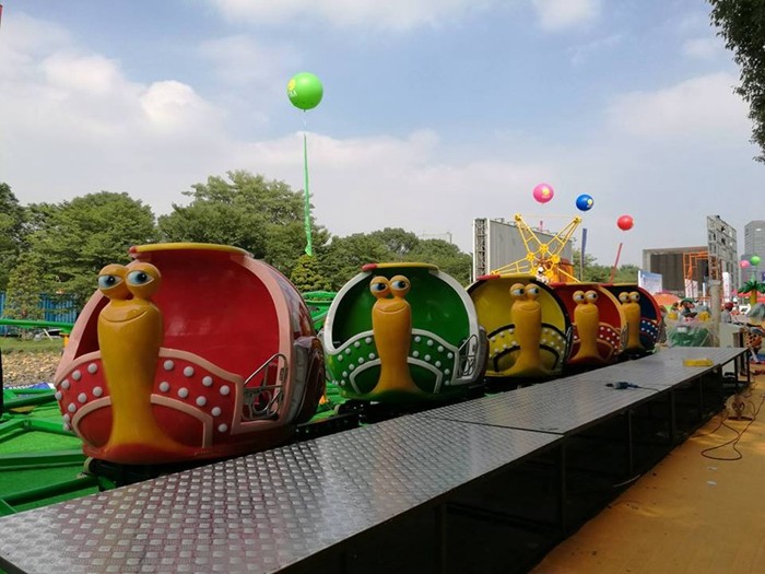 Mini Snail Shape UFO Roller Coaster Customized Height With Chain Lift Structure