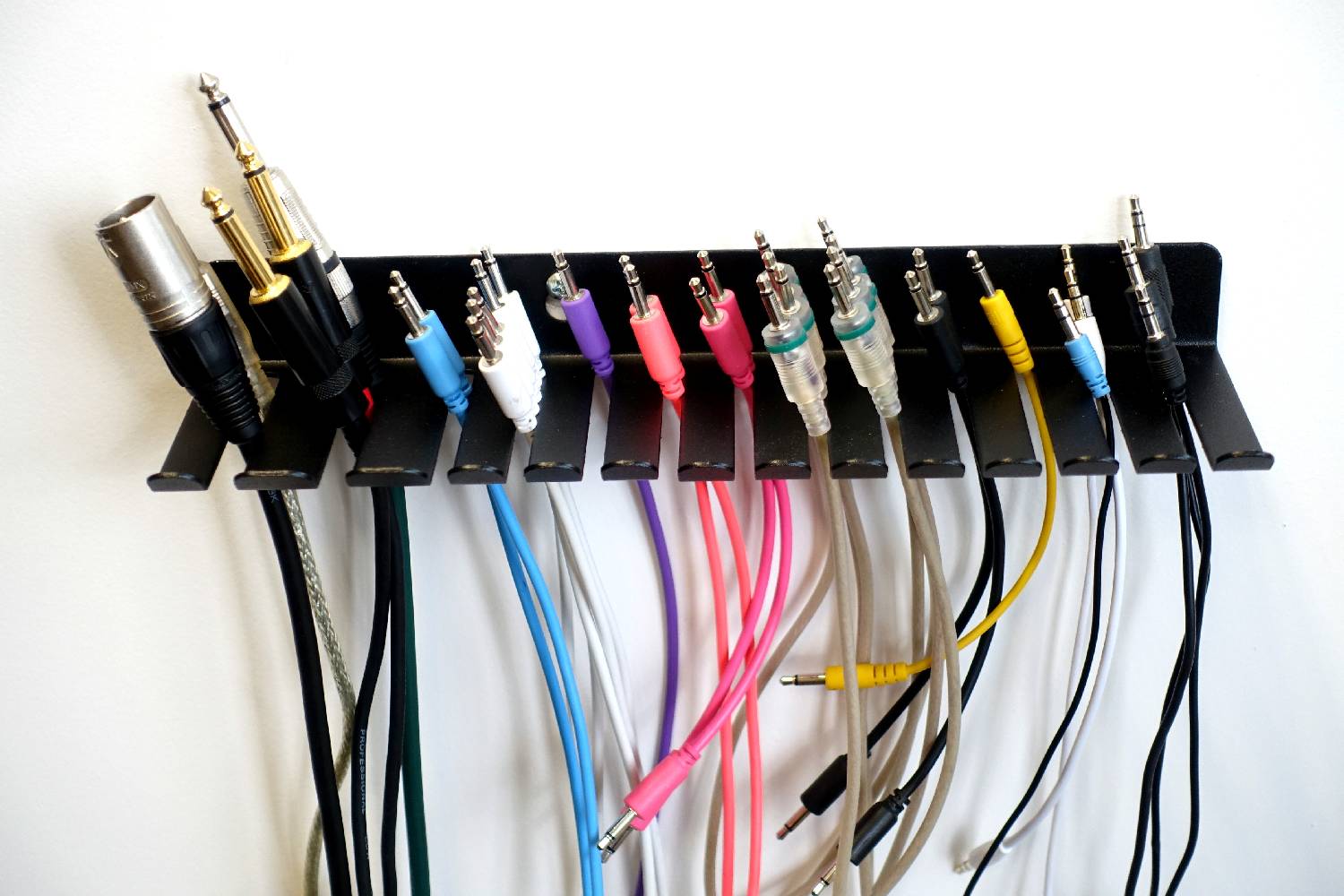 Space-Saving Wall Mountable Cable Hanger and Organizer for Hook Type Installation