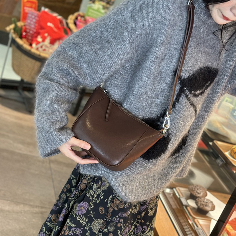 Upgrade Your Wardrobe with 2024 Spring's Flocked Cowhide Bag Versatile and Timeless
