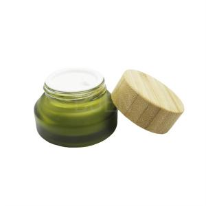 Wholesale Blue Glass Cosmetic Jars For Moisturizer Inclined Shoulder With Bamboo Lid 5g from china suppliers