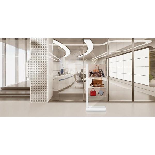 Demonstration of the screen's transparency in an exhibition setting