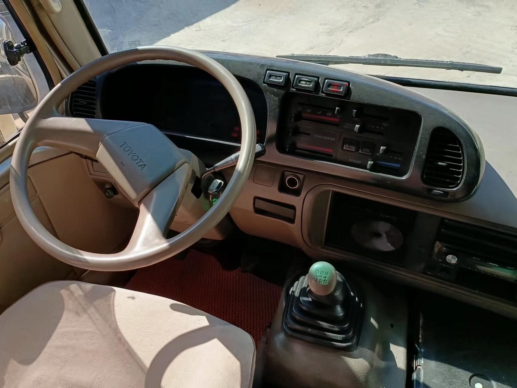 30 Seater Toyota Coaster Bus Japanese Mini Bus Open The Door Outside